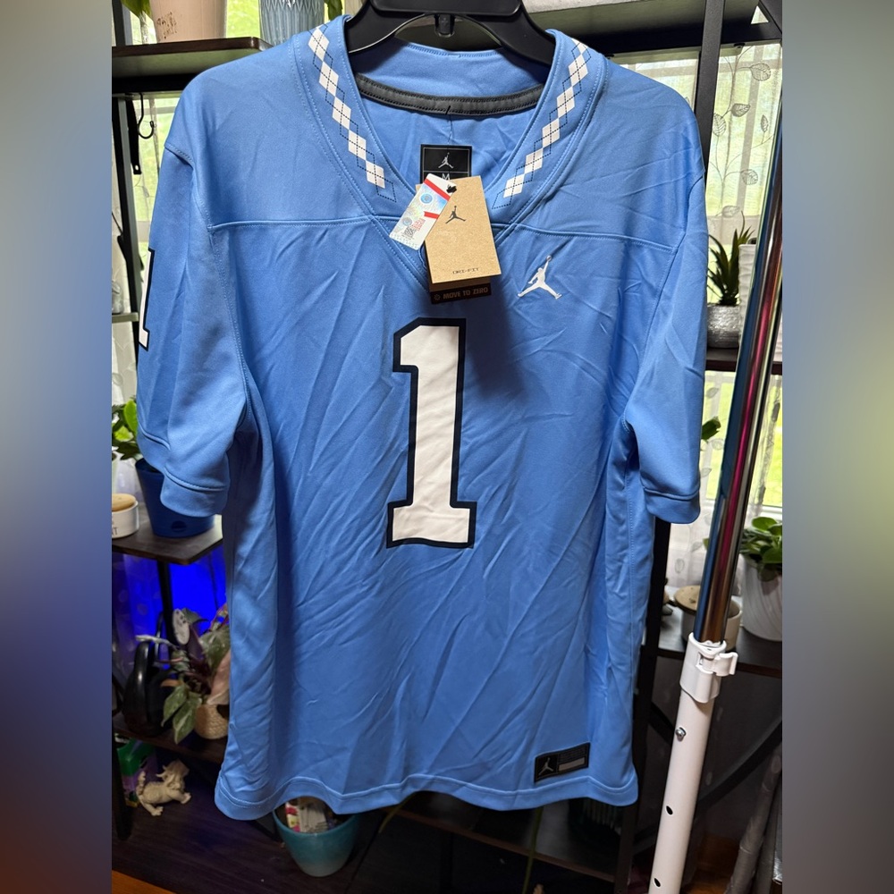 Jordan Men's Light Blue NCAA North Carolina Jersey with White Accents
